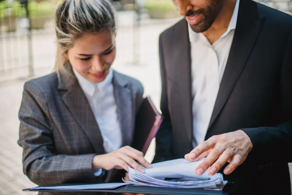 Employers discussing background screening requirements