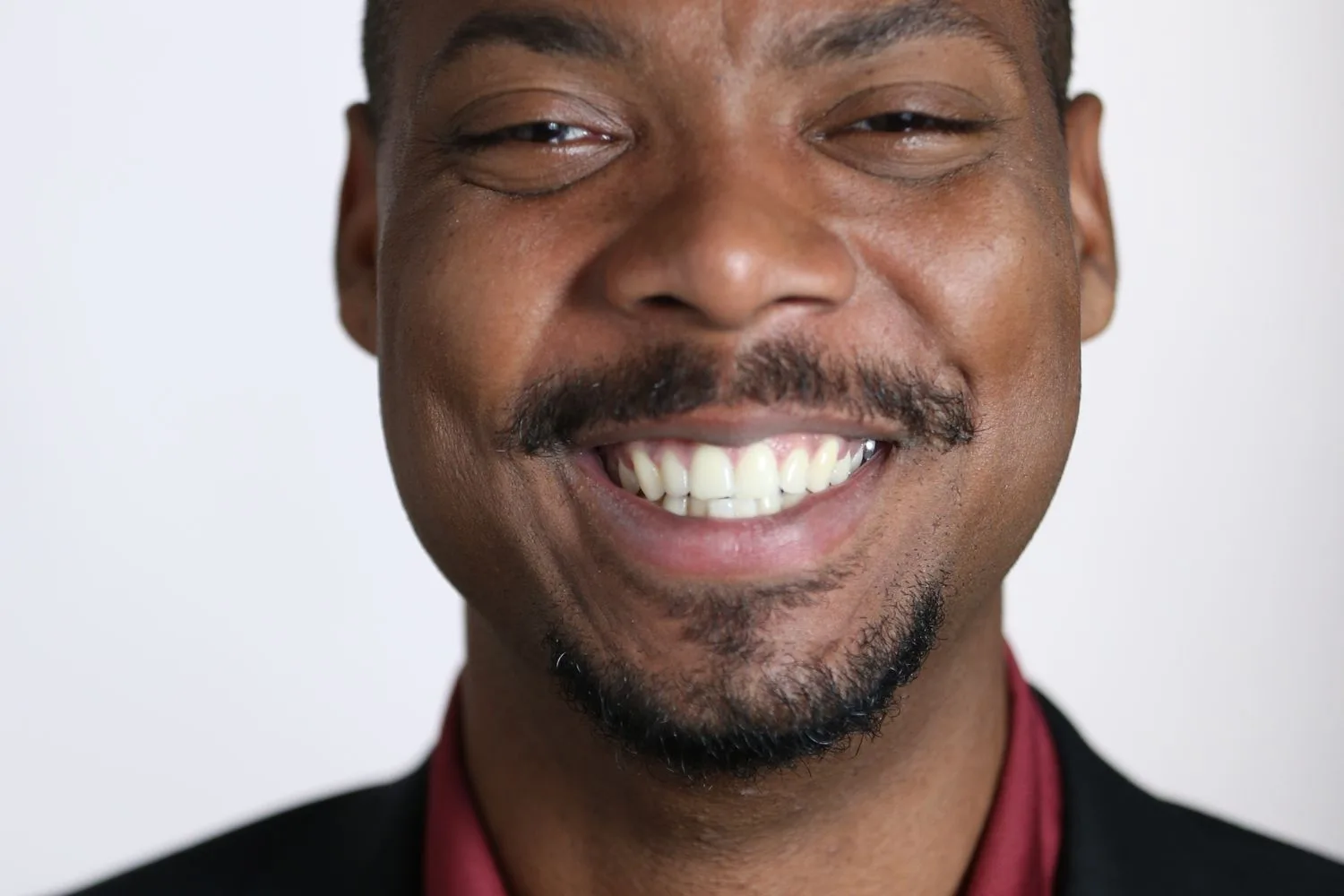 Compliant passport photo headshot on a plain white background